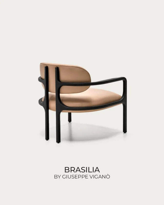 The Brasilia armchair stands as a testament to the compelling interplay of materials and form, where the sharp, geometric silhouette of the ash wood frame provides a sophisticated foundation for the rich and inviting high-quality leather upholstery, offering both visual interest and exceptional comfort.

Brasilia armchair - design @giuseppe_vigano